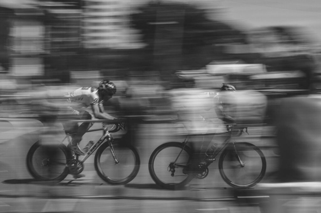 black and white urban endurance cyclists